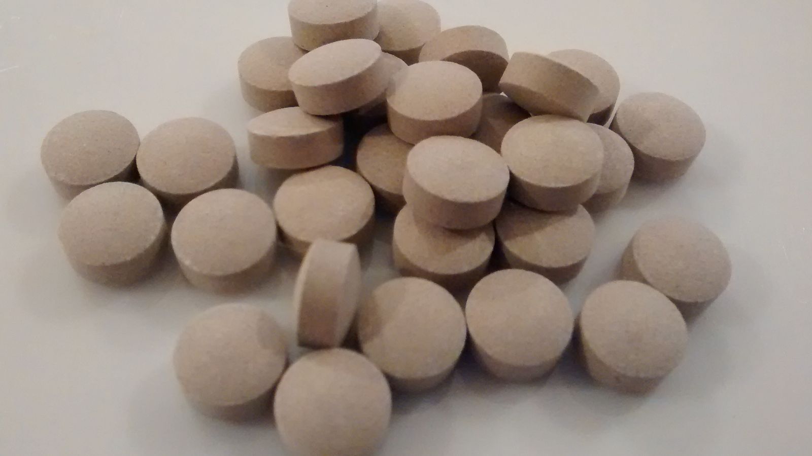 Supplement tablets on a table